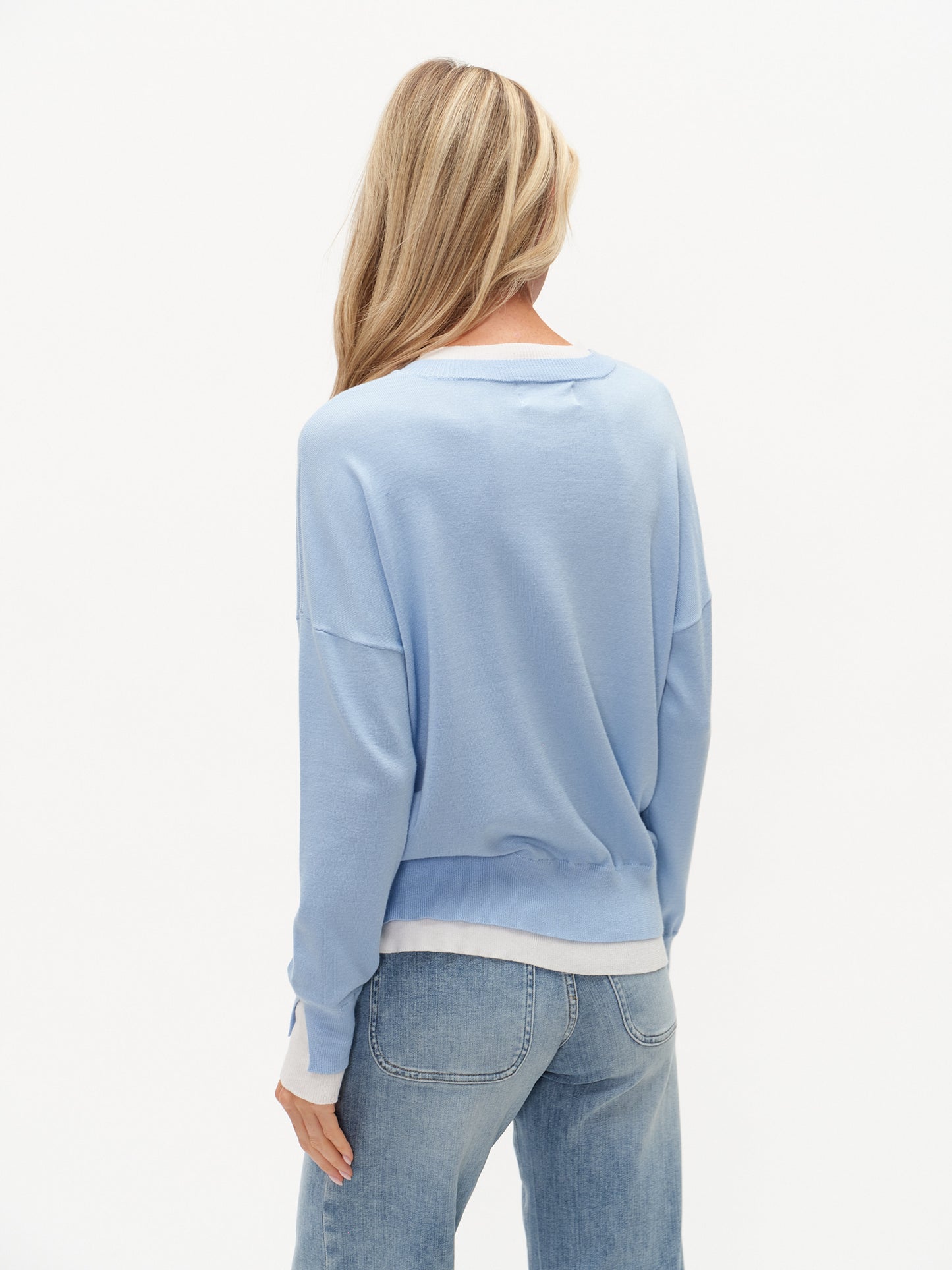 NOTCHED NECK DOUBLE HEMMED SWEATER