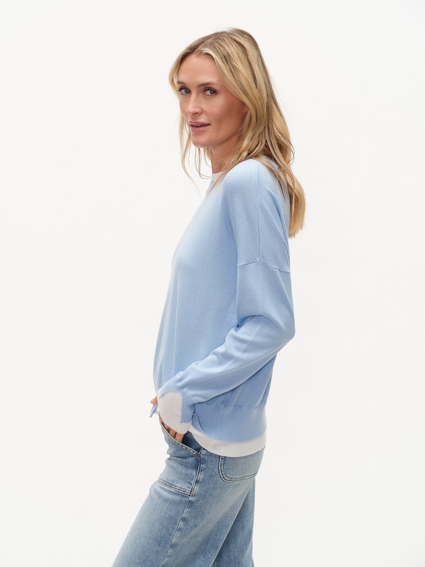 NOTCHED NECK DOUBLE HEMMED SWEATER